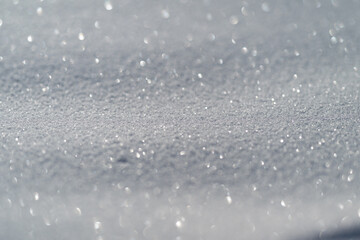 Obraz premium Sumptuous icy sparkle forming refined background for festive luxury visuals, Highend winter setting with shimmering snow accents and cool blue tones highlighting elegance