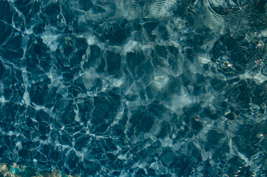 Abstract green water pattern with waves.
