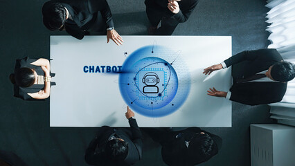 A team of professionals engages in a vibrant discussion about chatbot technology, emphasizing innovation and collaboration in a modern office environment. Trope