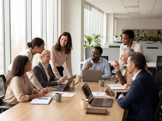 Diverse Business Team Collaborating in Modern Office Meeting