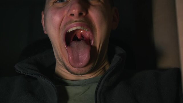 A man with his mouth open