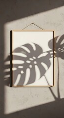 Wooden Poster Frame Mockup on Greige Wall with Plant Shadow