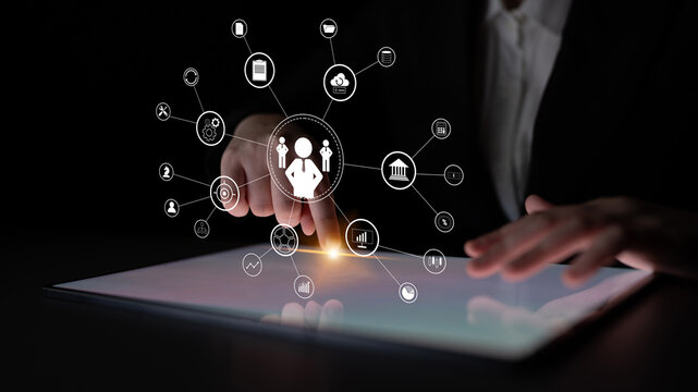 A concept of centralized business management and corporate strategy. A leadership team connecting to all functions like finance, operations, and planning. Motif