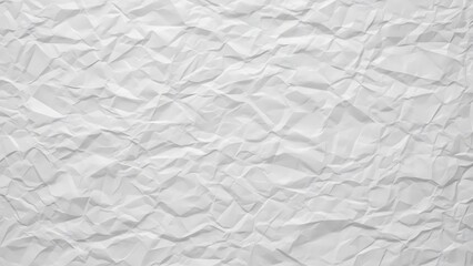 Fototapeta premium Textured close-up shot of a crumpled white paper sheet, displaying wrinkles and shadows