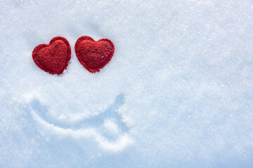 Fototapeta premium Valentine's Day, fun snow smiley, heart eyes on white snow background