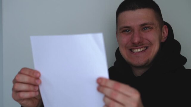 An actor reads a script from a paper remote before rehearsal.
Casting actors for a film role.
Reading from a paper remote