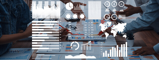 A dynamic business meeting showcasing data visualization tools, charts, and graphs as teams collaborate for effective decision-making in a modern office setting. Axiom