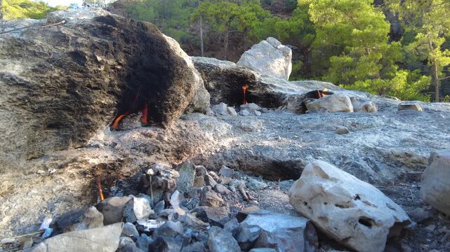 Antalya, &Ccedil;ıralı: Yanartaş (Chimera) in Olympos National Park. A natural methane gas flame that emerges from the rocky slope without extinguishing. A legendary and geological natural beauty.