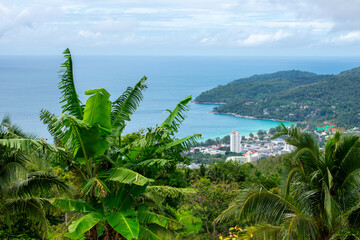Aerial view from Big Buddha on Coast of Phuket Island in Thailand. Beautiful landscape Jungle and turquoise blue water of Andaman Sea 