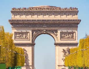 Fototapeta premium Triumphal arch (Arc de Triomphe) and Champs Elysees avenue in Paris, France