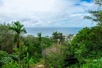 Aerial view from Big Buddha on Coast of Phuket Island in Thailand. Beautiful landscape Jungle and turquoise blue water of Andaman Sea 