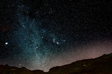 Stars gazing at night on Tenerife, mount Teide vulcano national park night excursion, astronomy educational tour, tourists destination, scenic view on mountains and stars on dark sky