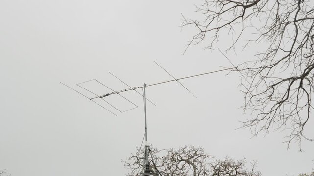 VHF radio communications directional antenna turning to search for radio signals. 