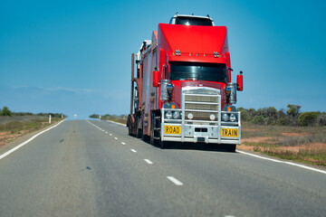Western Australian road train traveling through arid landscape close to Ningaloo coast
