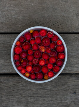 tropical fruit acerola on a bowl