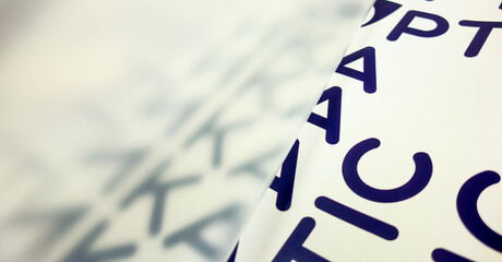 A sticker with a font on vinyl film.Mounting film for transferring the sticker to the surface.