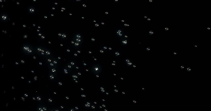This mesmerizing abstract video showcases shimmering soap bubbles on a bold black background, perfect for enhancing creative motion graphics and stunning visual effects in artistic projects