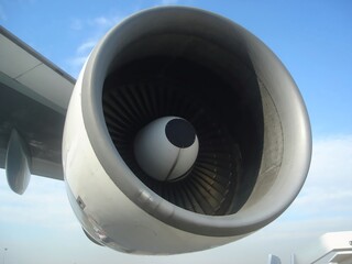 Close Up View of Aircraft Jet Engine Turbine with Blades and Nacelle