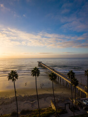 Fototapeta premium Scripps Pier in La Jolla, California at sunset, vertical image