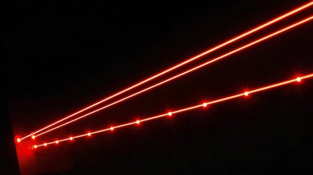 Red laser light beams shining bright.