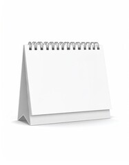 Plain white desk calendar with spiral binding, isolated