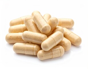 Pile of beige capsules on white background