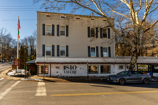 West Nyack, NY - US - Jan 24, 2026 Historic 1840 Tavern, formally the Clarksville Inn a roadside inn with winter light, bare trees, American flag, and small-town Hudson Valley charm.