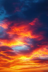 Obraz premium fiery sunrise sky filled with glowing orange, red and purple clouds above a luminous horizon, evoking awe and peaceful wonder