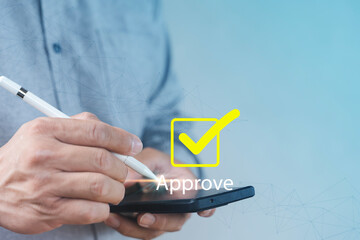 Digital Approval Concept on Smartphone with Stylus and Checkmark for Online Workflow
