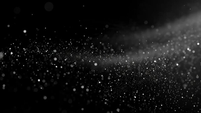 A cloud of snowflakes gently falling from the sky, viewed from below, in a serene winter scene, captured in a photograph
