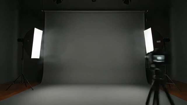 Professional photography studio setup with red velvet curtains and lighting equipment for capturing high-quality images.