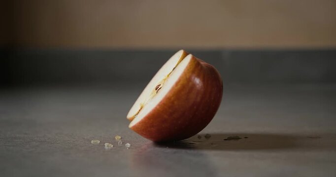 Half apple cut view with core and seeds closeup