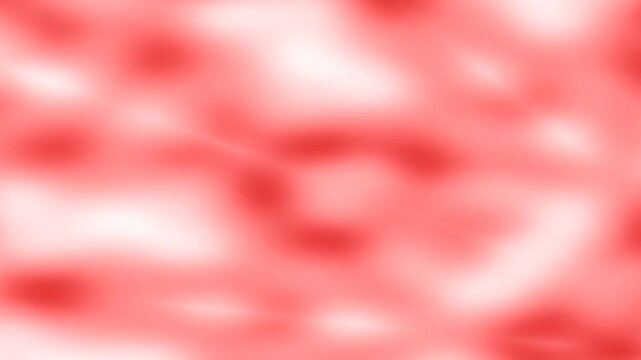 Abstract red background with blurred shapes and soft textures for design.