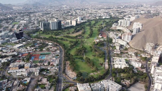 aerial lima la molina golf course view with sweeping green fairways nestled against arid hillside