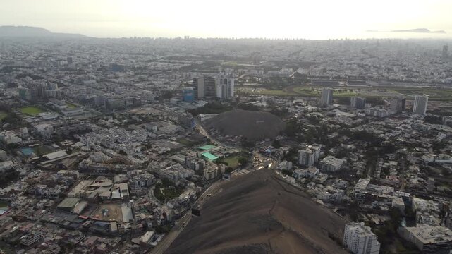 aerial view la molina hill lima cityscape at dusk, drone footage reveals dense residential sprawl