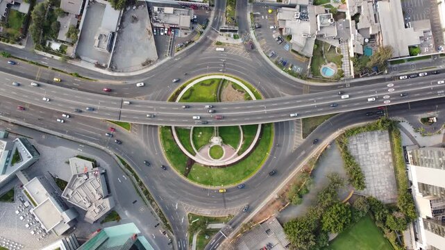 aerial roundabout view lima surco traffic showing circular green median with ornamental fountain