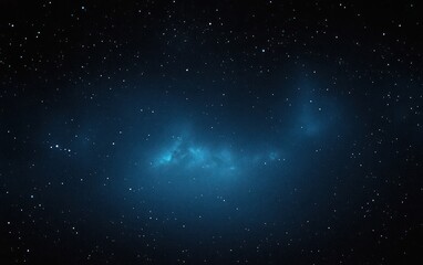 Obraz premium expansive dark starfield with a glowing blue nebula cloud across the center evoking quiet wonder and serenity