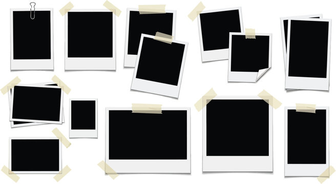 A collection of blank Polaroid photos taped to a white background
