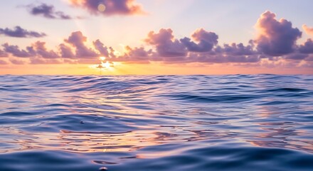 Obraz premium A serene image capturing the sunset over the ocean. 