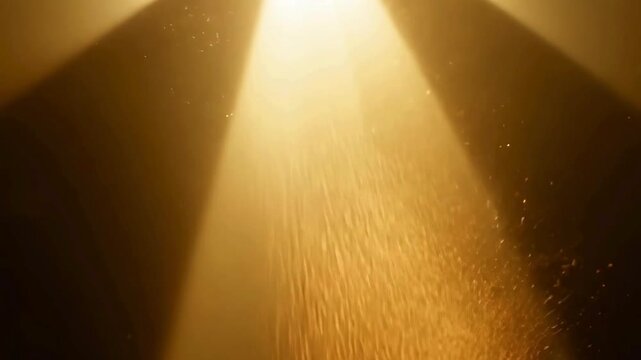 Warm cinematic light beams shining down with floating glitter and dust particles in a dark atmosphere.