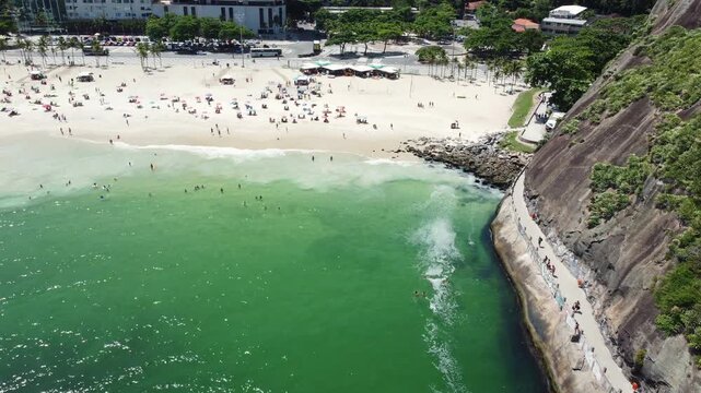 Aerial video of Leme beach a sandy beach nestled next to the Leme hill in Rio de Janeiro, Brazil