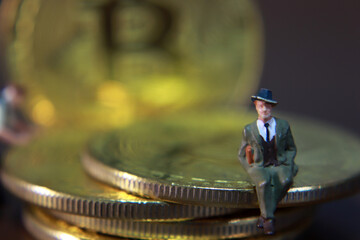 Bitcoin and Miniature People. Bitcoin Investment Concept.