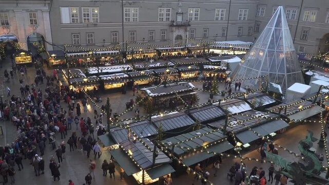 Domplatz square at dusk, central Salzburg, Austria. Winter season.