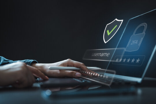Multi factor authentication login on laptop with password and verification code. Concept of cybersecurity, identity protection, secure access, and modern digital authentication technology.