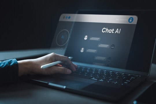 Virtual AI assistant hologram interface on laptop screen showing chat interaction. Concept of artificial intelligence, automation, smart assistant, and future digital technology for applications.