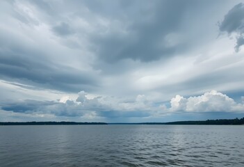A vast expanse of tranquil lake water under a dramatically cloudy and atmospheric sky. albemarle sound 