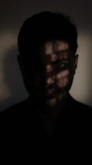 Obraz premium Generative AI Portrait with Dramatic Shadows and Intricate Light Patterns