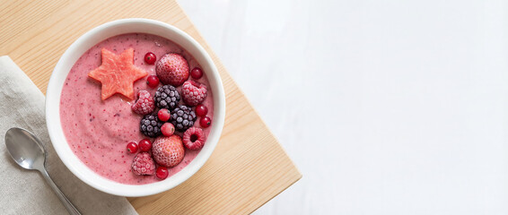 Pink Yogurt Smoothie Bowl with Frozen Berries and Watermelon Star