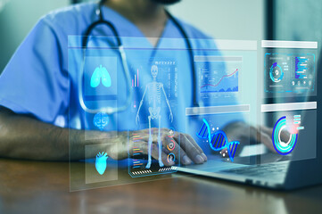 Doctor using computer AI technology for patient data storage, health monitoring and insurance services.