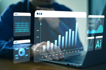 Businessman working on computer using AI for financial data analysis and smart investment strategy.